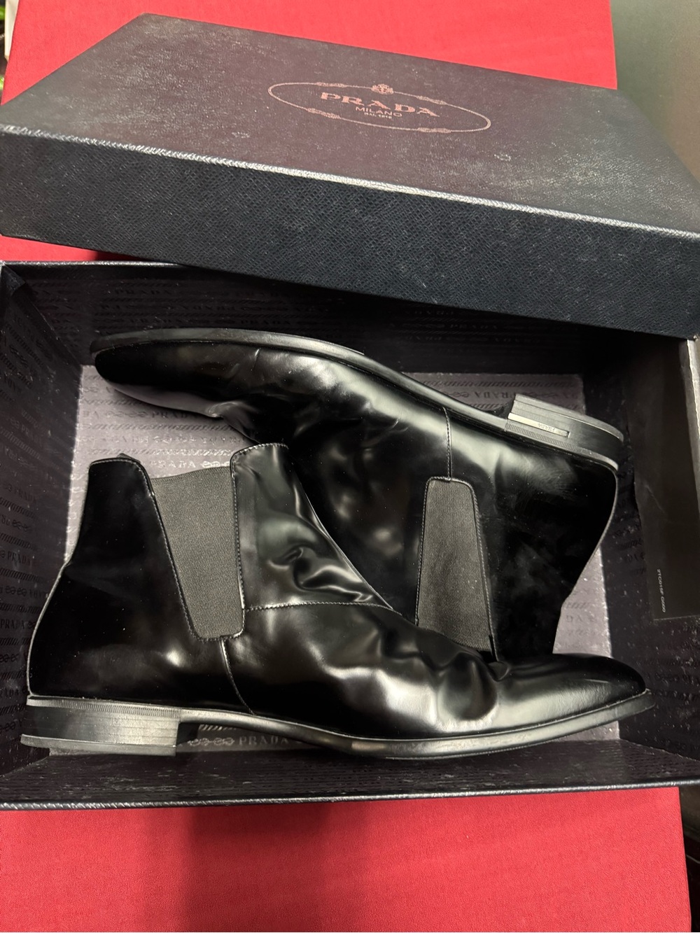 Prada Black Leather Slip-On with Gold Logo - Picture 12 of 16